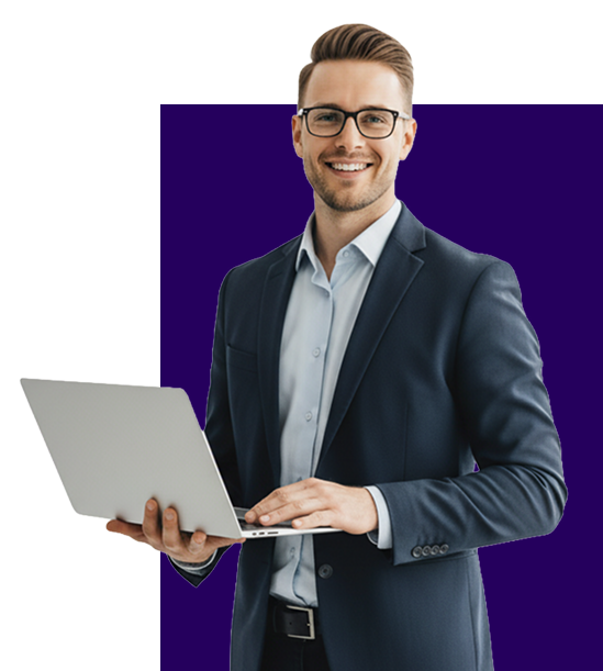 Professional man smiling, wearing glasses, holding a laptop.